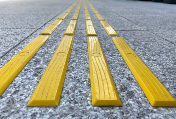 istock Bright yellow tactile paving for the visually impaired 1385944768