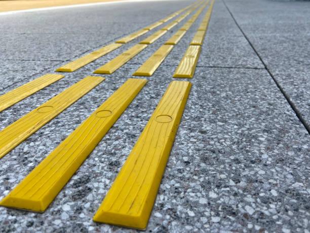 istock Bright yellow tactile paving for the visually impaired 1385944791