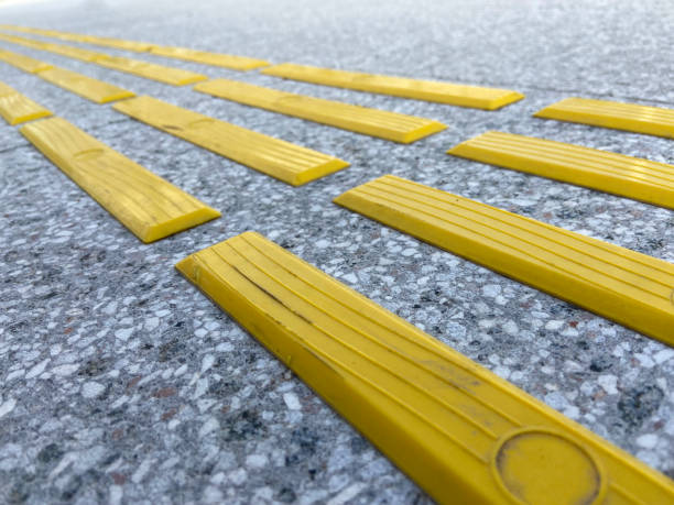 istock Bright yellow tactile paving for the visually impaired 1385944797