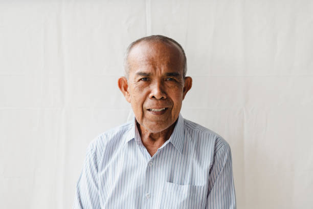 istock Happy Senior Man Studio Portrait 1385956544