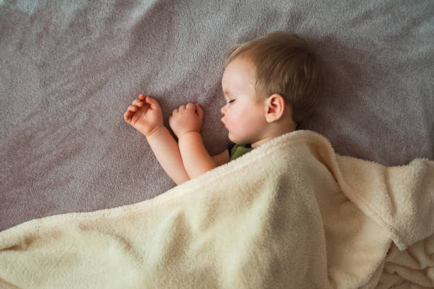 A sleeping newborn baby