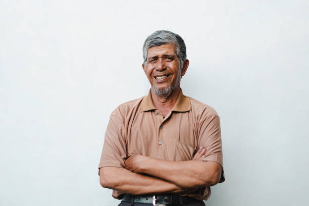 istock Happy Senior Man Studio Portrait 1385963516
