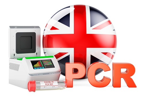 PCR test for COVID-19 in the Great Britain, concept. PCR thermal cycler with British flag, 3D rendering isolated on white background