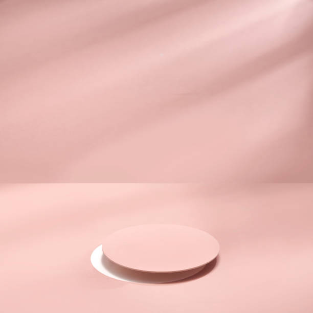 istock Minimal scene with geometrical forms. Cylinder podiums in soft pink background with shadow 1385968102
