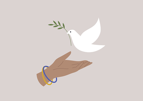 A dove of peace holding an olive branch, Ukranian freedom and Peace