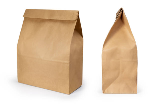 istock Brown paper bag isolated on white background with clipping path 1385968568