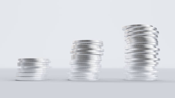 istock Stack of metallic coins isolated on white background, 1385970823