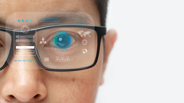 istock man wearing eyeglasses with virtual screen future technology, biometric of a scientist with futuristic graphics and holography with which scans, immersive technology, metaverse universe. 1385971966