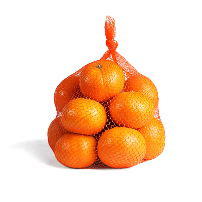 Mandarin Oranges in Plastic Mesh Sack on White Background