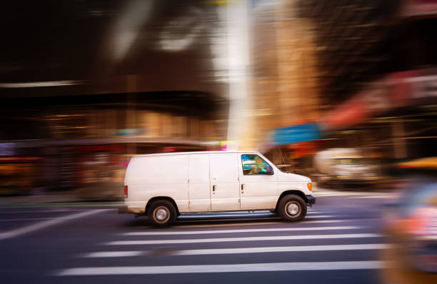 istock White van speeding in the city 1385975700