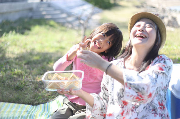 istock Family having a picnic on the beach 1385977777