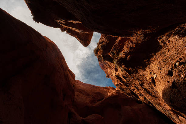 Red rock formation with hollow above in Salta, Argentina