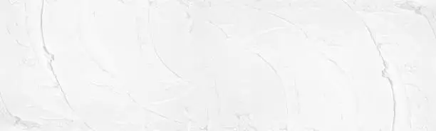 Smears of white plaster wide large texture. Light putty strokes pattern. Abstract whitewashed widescreen background