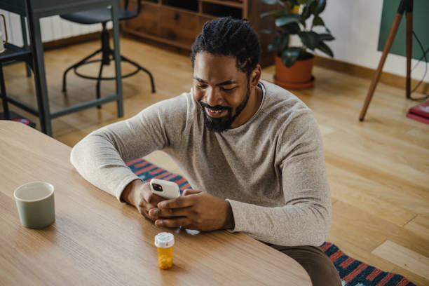 istock Young man is researching about a medicine on the internet 1385981123