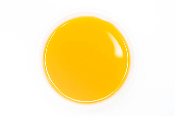 istock Vegetable olive oil bowl isolated on white background top view 1385981986