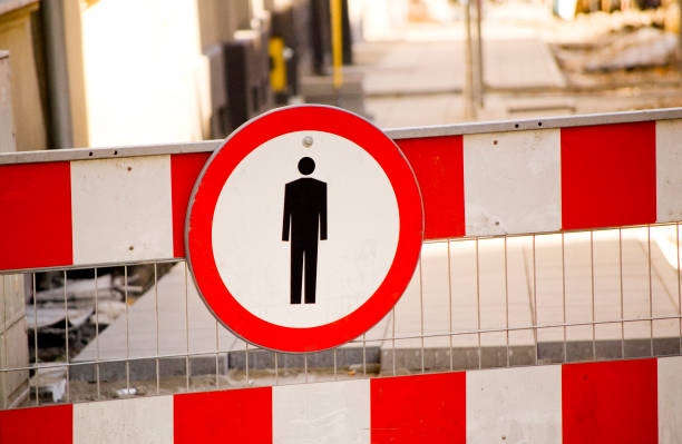istock No entrance for people road sign. 1385983342