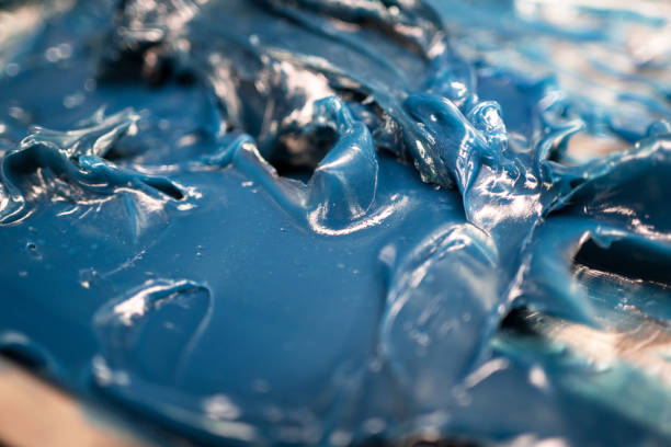 istock Selective focus of lubricating grease Lithium complex with blue dye on the plate. Industrial and automotive concept. Manufacturing in the factory. Testing and inspector 1385990548