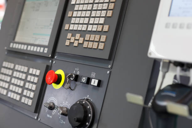 istock CNC control panel of a machining center close up 1385991910