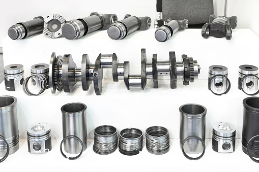 Car crankshaft, camshaft, cylinder liner and valve block in a parts store
