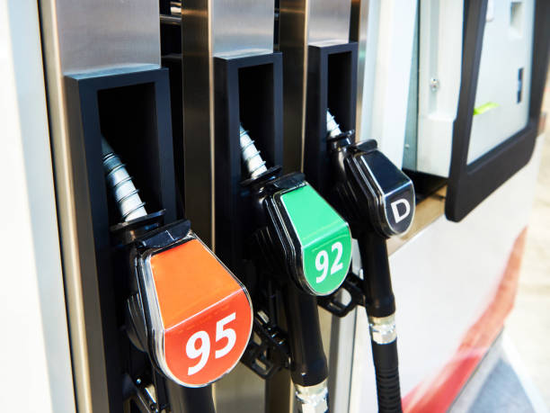 istock Fuel nozzles on filling station 1385991990