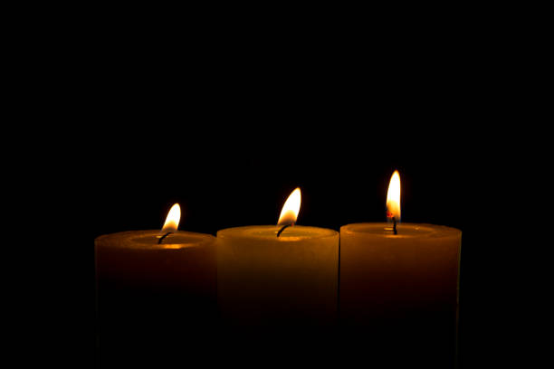 istock Warm candlelight on a dark mysterious background 1385993074