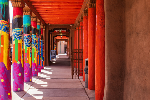 colorfully painted columns on the plaza in Santa Fe, New Mexico
