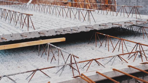 Stacked Perfabricated Precast Rebar Reinforced Concrete Ceiling Slabs Stored Outdoors on Construction Site