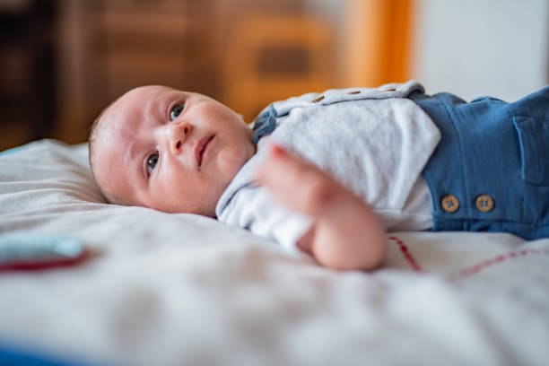 istock Newborn baby boy at home 1385997039