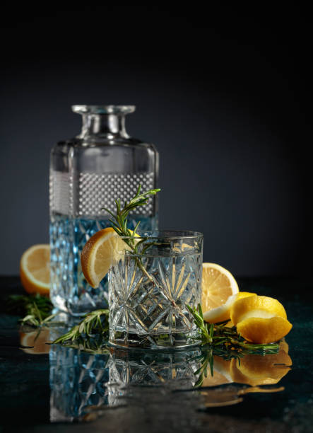 istock Gin tonic cocktail with lemon and rosemary. 1385998878