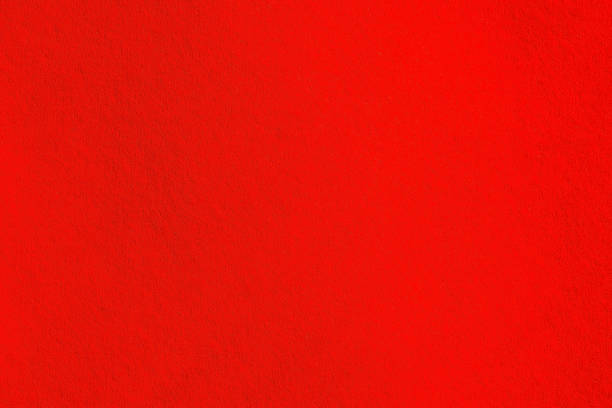 Elegant red canvas background. Scarlet background for festive decoration and internet design. paper texture stock photo