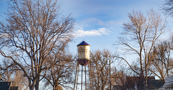 Water tower stands near rail tracks at Arvada.