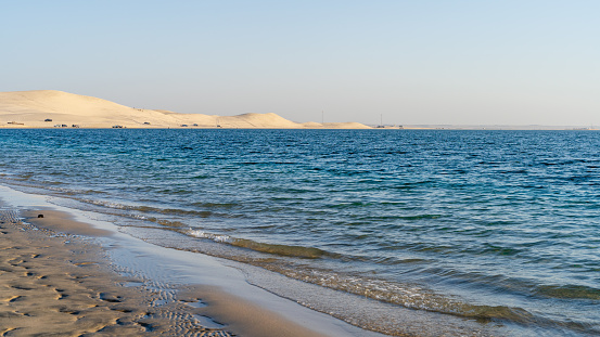 Doha, Qatar- March 11,2022 : view of sealine sea shore during the low tide.