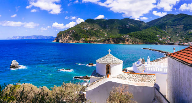 Beautiful islands of Greece - Skopelos. Old town, stunning sea view with church stock photo
