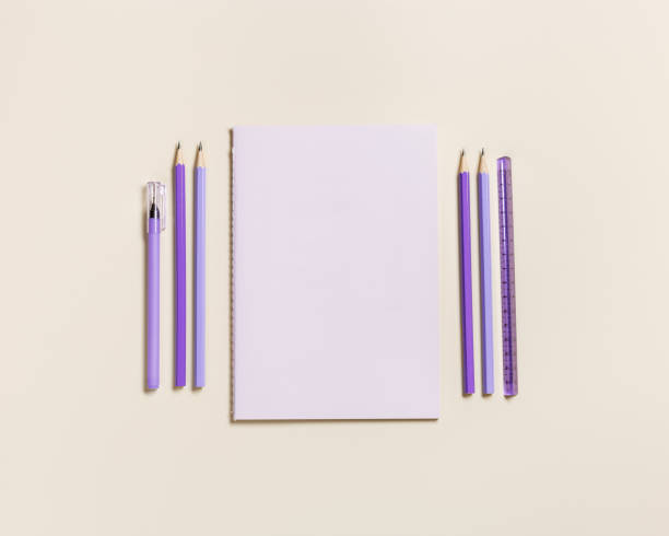 istock Frame with school stationery violet color. Back to school concept, notebook, note, pen, paper clips on pastel beige background. Office equipment with copy space, geometric flat lay, top view 1386010100