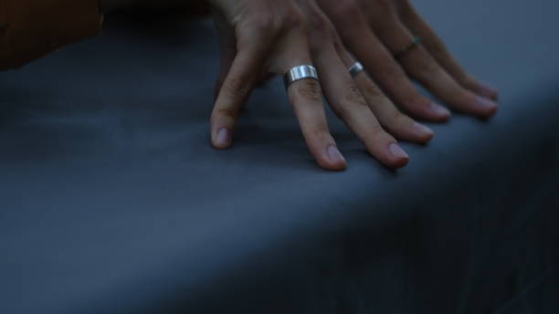 istock Woman hands with rings 1386019776