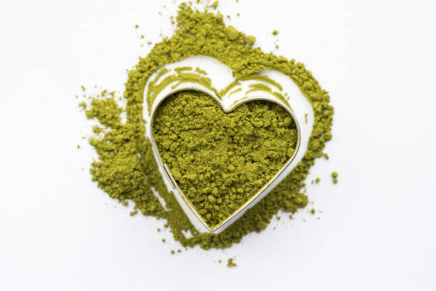 istock Matcha Tea Powder in a  Heart Shape 1386021586