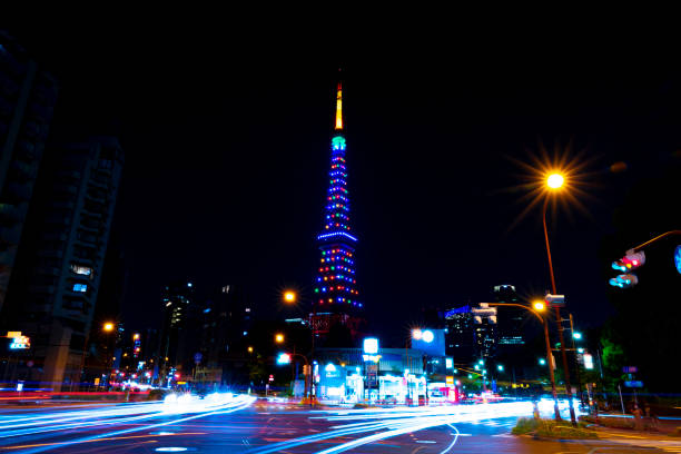 An illuminated Tokyo Tower at night wide shot. High quality photo. Minato district Shibakoen Tokyo Japan 05.04.2022 It is center of the city in Tokyo.
