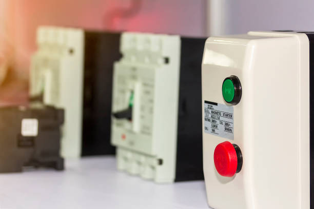 istock various kind electrical equipment on-off switch and circuit breaker (accessories for control electric power) on table for industrial 1386022802