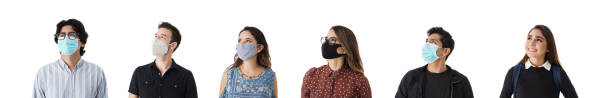 istock Latin students with masks looking away 1386023001