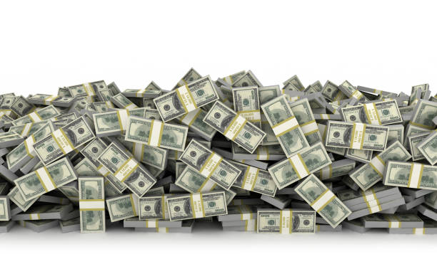 istock Tall pile of us currency wall 1386025203
