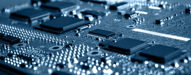istock Closeup of Printed Circuit Board with  integrated circuits and many other passive electrical components. 1386026838
