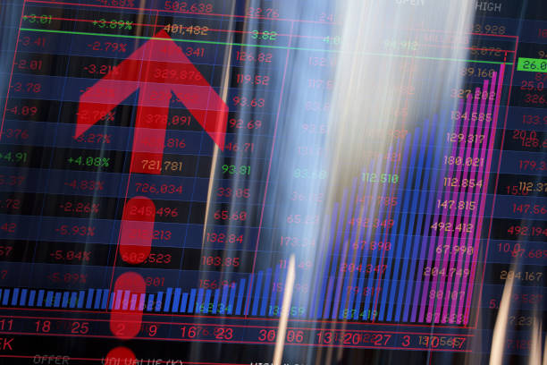 istock Graph, Arrows and Trading Screen Data with blurred office buildings. 1386027129
