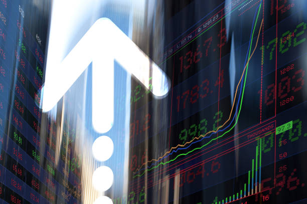 istock Graph, Arrows and Trading Screen Data with blurred office buildings. 1386027253