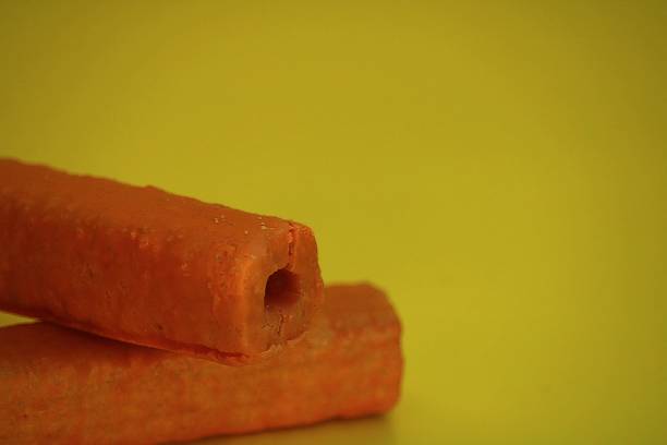 istock a stack of food on a yellow background 1386030164