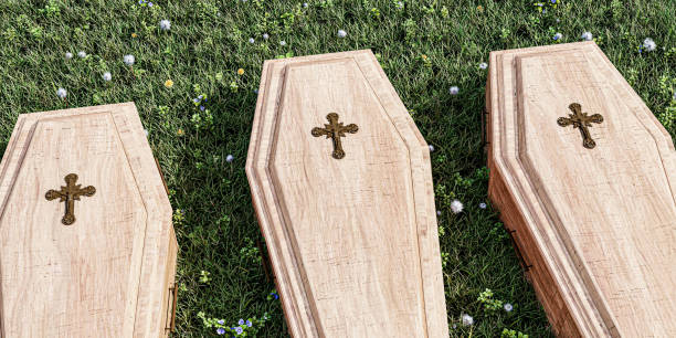 istock wooden brown coffin on grass 3d illustration 1386032360