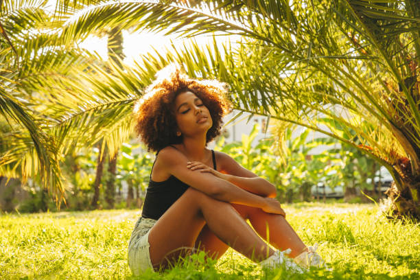 istock Pretty young afro woman 1386032706