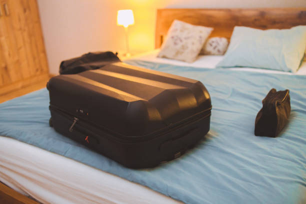 istock A suitcase, a bag and a make-up bag packed for a trip 1386033363