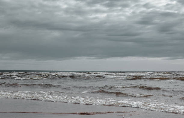 istock Atmospheric scenery Dramatic Baltic sea, waves and water splashes on breakwaters 1386040761