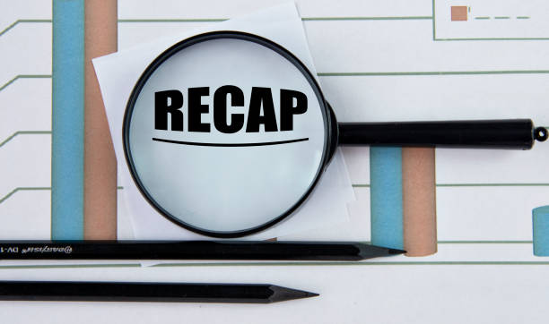 istock RECAP - word on a graph with pencils and a magnifying glass 1386046110