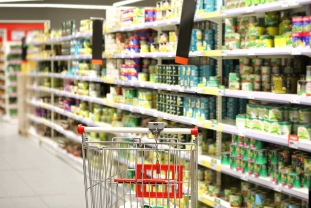 istock empty grocery cart in an empty supermarket 1386051353